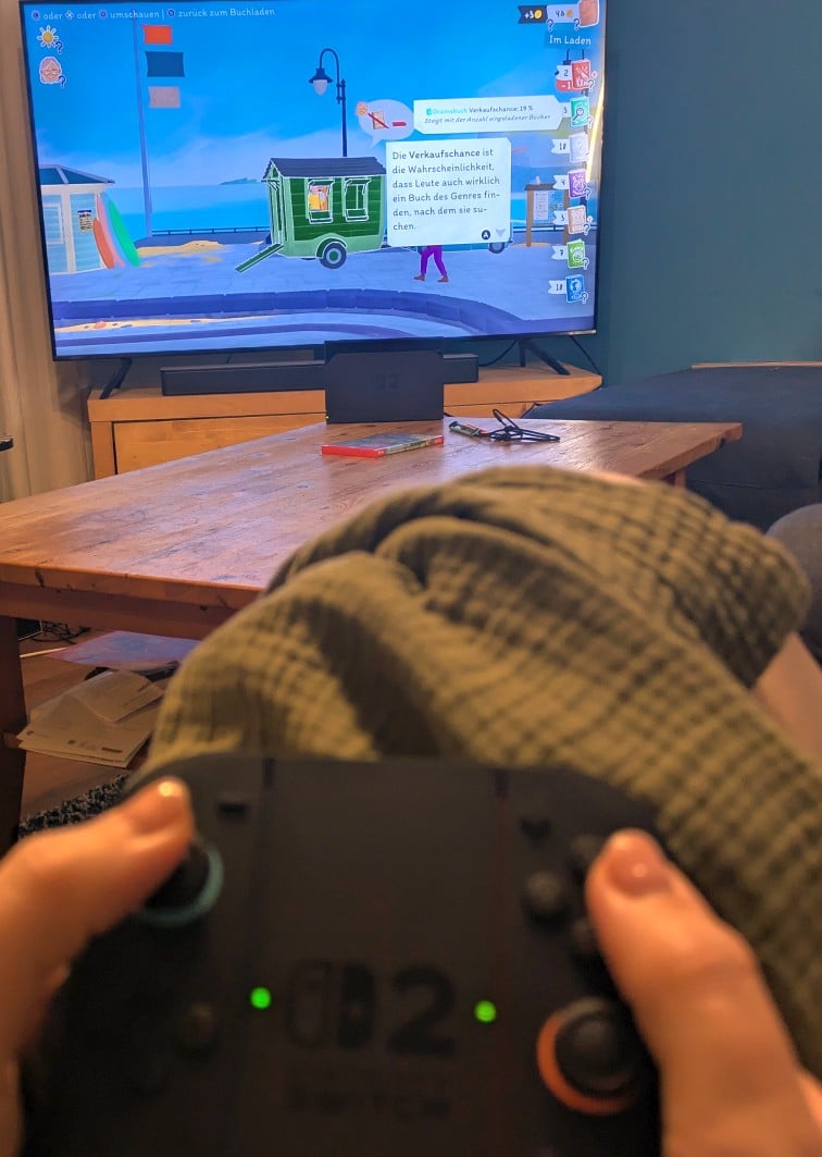 Die Nintendo Switch 2, Alu spielt ein Buchspiel